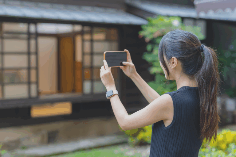 Woman taking photo with phone