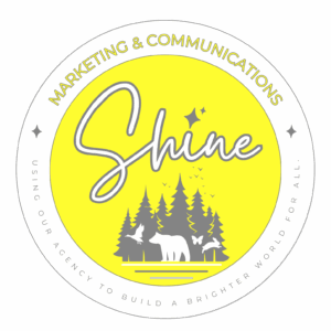 SHINE Marketing & Communications Logo - yellow circle with image of pine trees and various animals